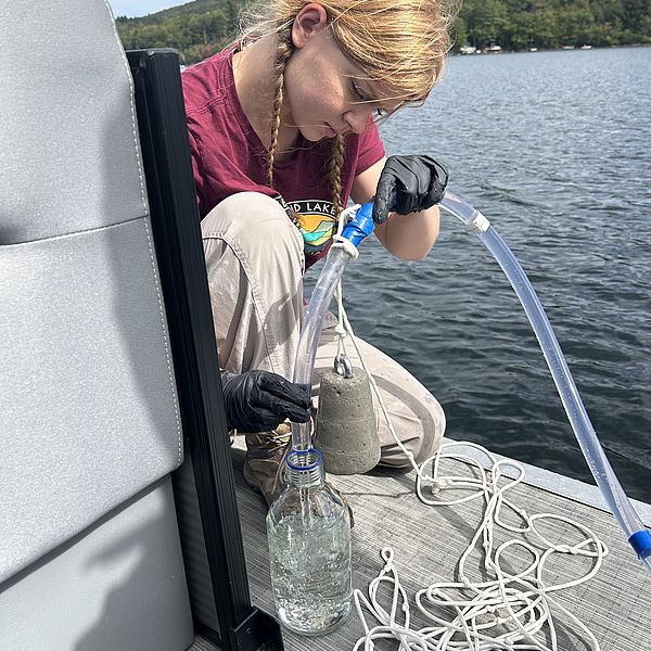 NLRA staff member samples for invasive spiny water flea in Newfound Lake.