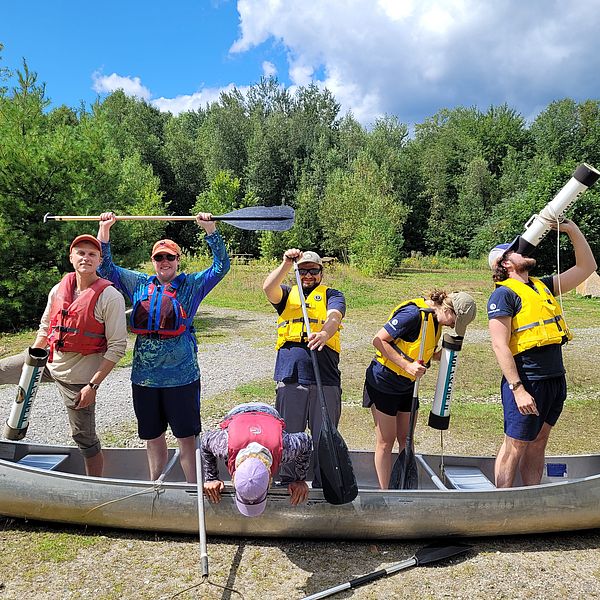 Volunteers of the Weed Stampede strike a pose before entering the water.