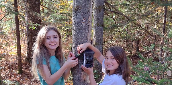 Danbury Elementary student hang a camera trap