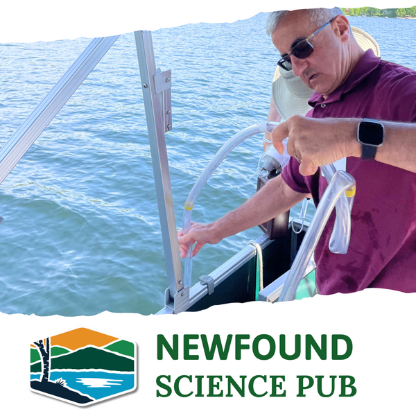 a volunteer takes a water sample from Newfound Lake