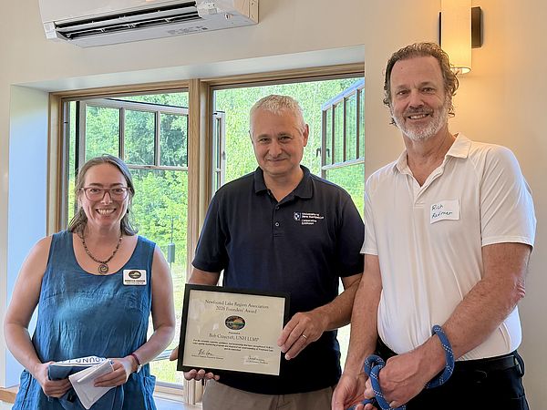 Rebecca Hanson left, Bob Craycraft center holding the Founders’ Award Certificate, and Rich Radimer right