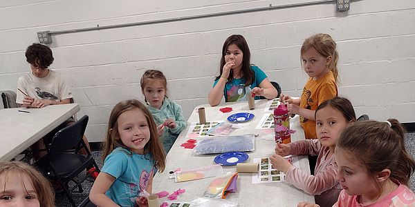 Students at TTCC after school program learn about the natural world