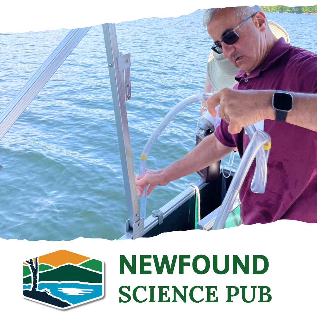 a volunteer takes a water sample from Newfound Lake